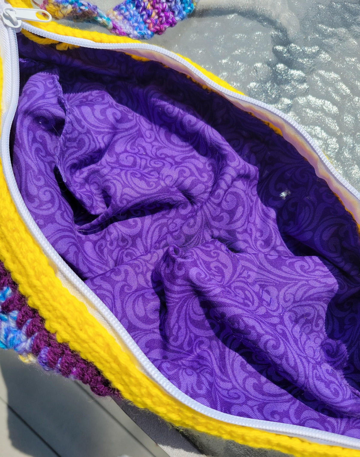 Crocheted crossbody bag. Sunflowers. Purple and multi with yellow.
