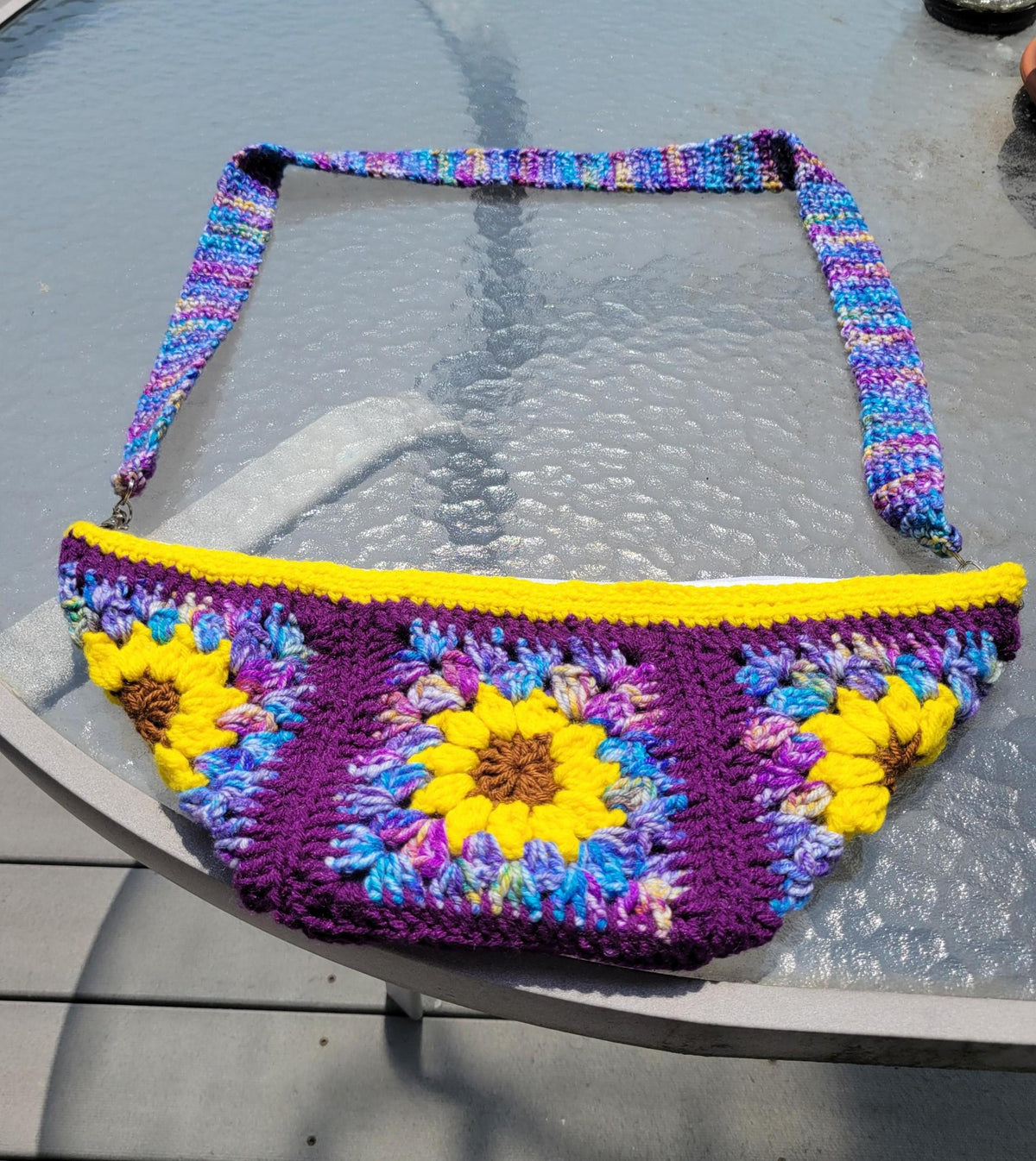 Crocheted crossbody bag. Sunflowers. Purple and multi with yellow.